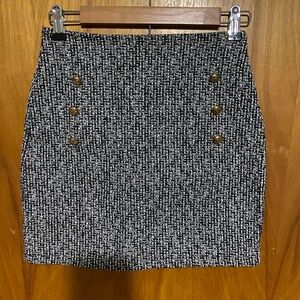 Tweed skirt with buttons